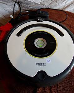 lot 150 image: iROBOT ROOMBA WITH CHARGING BASE - TESTEDTALKINGCHARGING