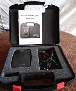 lot 204 image: TENS 3000 Electrical Stimulation Unit Analog with Electrode in Hardcase