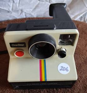 lot 206 image: Vintage Polaroid One-Step Rainbow Land Camera