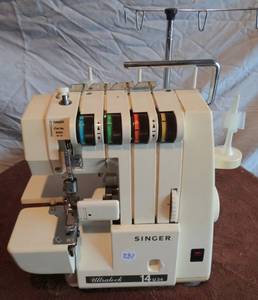 lot 231 image: Singer UltraLock 14U34B Serger Sewing Machine - No Power Supply