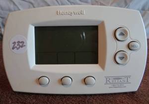 lot 232 image: HONEYWELL DIGITAL THERMOSTAT