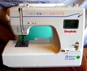 lot 324 image: VINTAGE  Simplicity Quilters Classic Sewing Machine w Case