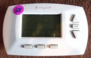 lot 328 image: HONEYWELL DIGITAL THERMOSTAT