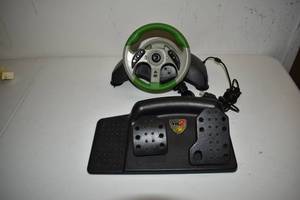 lot 104 image: MadCatz Xbox Steering Wheel and Gas Pedal