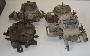 lot 7 image: 2 - 4 barrel Carburetors and 2- 2 barrel carburetors