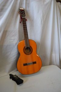 lot 9 image: Ventura Guitar Model V-1584 with Picks and Strap (One String Broken)