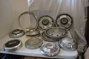 lot 57 image: Misc Chevy Hub Caps and Rings as shown