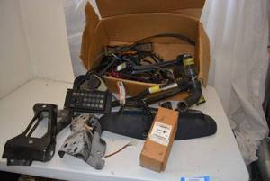 lot 89 image: Misc. Parts Auto bumper mount brackets, radiator hoses, lights and more