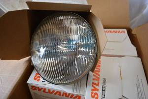 lot 104 image: 4 Sylvania Par 64 Bulbs still in Boxes and one par 56