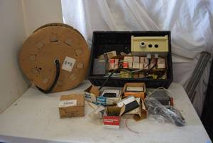 lot 105 image: large lot of electrical items Spool of Plastic Cable Cover, Dual Outdoor Light, Amp Readers,