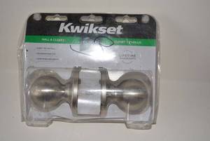lot 197 image: Kwikset Hall and Closet Handle, Brushed Nickel, Still in Packaging