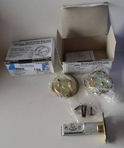 lot 198 image: Kwikset Round Pocket Door Lock, (2 Total)