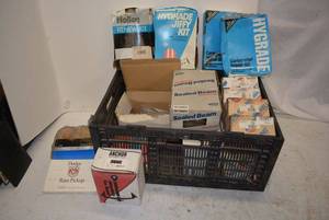 lot 136 image: Carburetor Repair Kits, Headlamps and More HIGHLY RECCOMEND PREVIEW ON THIS ITEM FOR BEST LISTING OF ITEMS.
