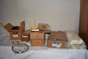 lot 270 image: Misc. Car Parts Power Steering Repair Kit, Melling Oil Pump, Motorcraft Brake Shoe Kit, and More