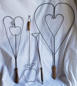 lot 234 image: Vintage Twisted Wire Rug Beaters