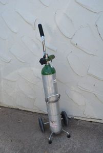 lot 246 image: Personal Rolling Oxygen Tank