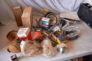 lot 262 image: Misc. Car Parts Vintage lights, gears, fuel pump parts, 1970s Trim pack
