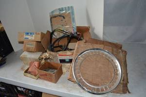 lot 331 image: Misc Car Parts Includes GM Power Window Motor, Cruise Control Unit