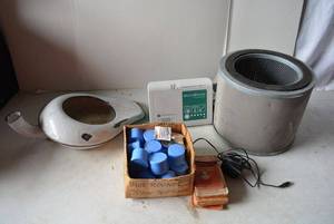 lot 436 image: Vintage Bed Pan, Air Filter, Medical Alert Device, Blue Rounds of Clear Tape, and Stamps