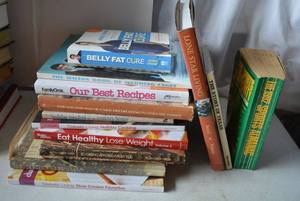 lot 442 image: Cook Books, Lone Star Living, The Story of Texas, and The 1992 Sports Almanac