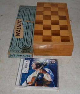 lot 381 image: Chess Board with Wood Craved Pieces, Walnut Cribbage Board and Unopened John Denver CD