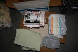 lot 380 image: Delta Chrome Hand Towel Holder, Shower Curtain, Pill Separator, Sheets, Large Fabric Piece
