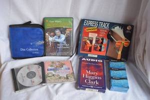 lot 392 image: CD Holder, Express Track to Spanish CDs, Sony DVC Tapes Unopened, and More