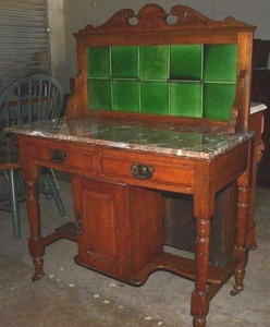 lot 502 image: Vintage Marble Top Washstand with Tile Backsplash, Metal Wheels