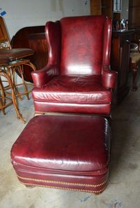 lot 487 image: Hancock & Moore Fine Leather Armchair and Ottoman, Wooden Legs, Button Trim