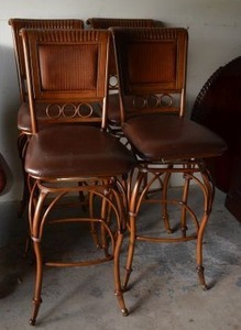 lot 488 image: 4 Padded Swivel Bar Stools, Metal Frame looks like Wood, Padded Back
