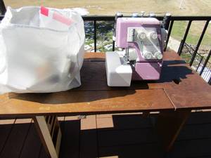 lot 9 image: My Loc Sewing Machine  with Memory Disc 2,3,4,5,6,9 and 17   plus New Home SEWING  CABINET