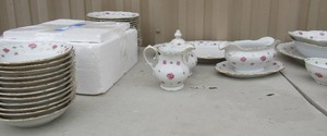 lot 69 image: Vintage Winterling China Bavaria Germany Heritage Pattern set. 12 dinner plates, 12 tea cups, 10 saucers, 16 bread plates, 12 dessert bowls, 1 creamer, 1 sugar, 1 gravy boat, 2 large serving bowls, 1 lg plate and 1 serving platter