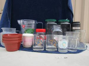 lot 95 image: 2 green lid canisters santa cup, drinking cups and small brown bowls