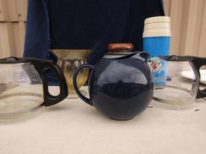 lot 102 image: Yellow bubble glass vase and navy blue water pitcher  Two 12 pot coffee pots,