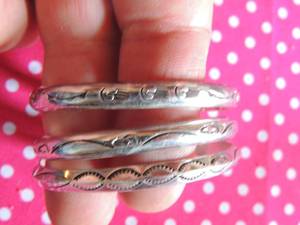 lot 174 image: Sterling silver bracelets x 3   TW 56 gms. -   Navajo Native American Crafted