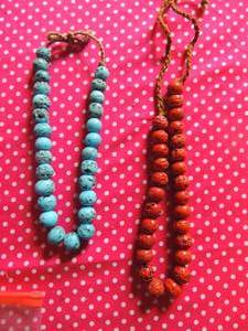 lot 193 image: 2 turquoise necklaces 1 blue 1 red