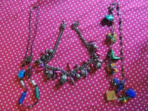 lot 199 image: 3 necklaces- carved bead, 1 silver balloon, purple, and pink, LA Palma Salvadorian