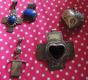 lot 160 image: Sterling lot TW 95 gms- Pendants (2 with Blue lapis), hollow form heart, large black onyx heart and artisan crafted male figure pendant with bow tie
