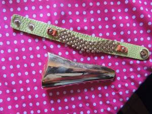 lot 168 image: Gold tone belt closure and lime greengold leather bracelet