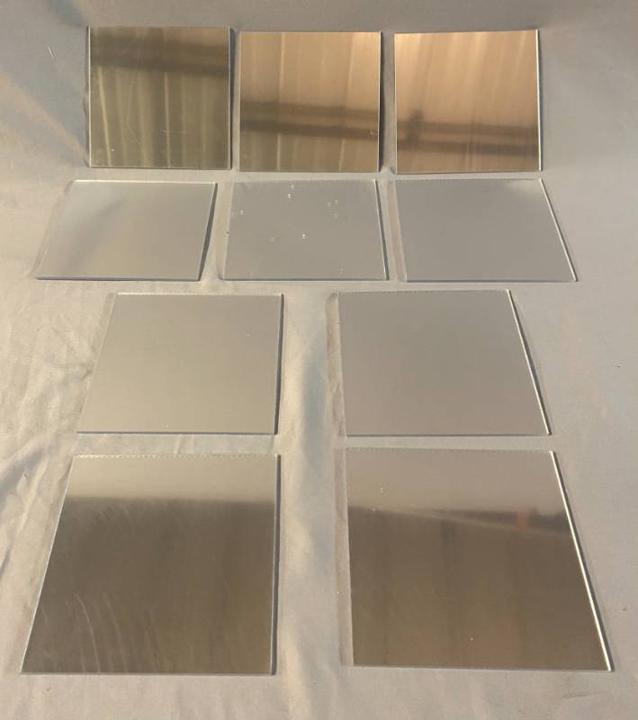 lot 156 image: 4 x 4 x 18 10 Mirrors with Plastic still on them