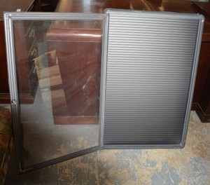 lot 38 image: Quartet  Radius Design Changeable Letter Directory, 2 x 3, Graphite Frame, Locking Glass Front