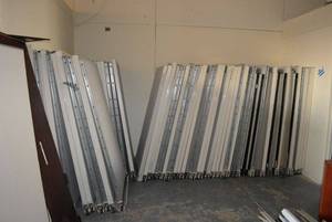 lot 58 image: LARGE LOT OFFICE DIVIDERS, STORAGE COMPARTMENTS WITH LIGHTS, AND DESKS (SEE ALL PICTURES)