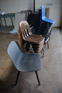 lot 64 image: Plastic Stackable Chairs, different styles as shown