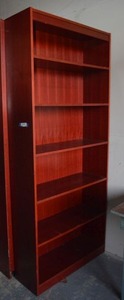 lot 62 image: Riverside Furniture, Reddish Wood Bookcase (7 x 3 x 1)