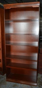 lot 74 image: Reddish Wood Bookcase (7 x 3 x 1)