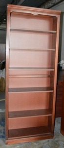 lot 73 image: Riverside Furniture, Reddish Wood Bookcase (7 x 3 x 1)