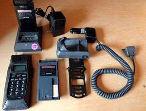 lot 75 image: VINTAGE PHONE SYSTEM WITH 2 BATTERIES, CHARGER, AND AUTO ADAPTER