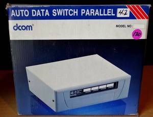 lot 120 image: DCOM Auto Data Switch Parallel 4-1 Printer 4 Port Model AMP4-1  UNUSED IN BOX