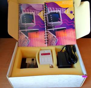 lot 207 image: VINTAGE INVISIBLE SOFTWARE COAXIAL ETHERNET ADAPTER