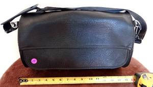 lot 15 image: ROUND LEATHER MOTORCYCLE SADDLE BAG WITH SHOULDER STRAP